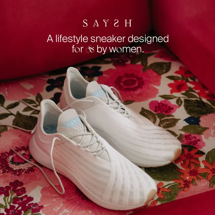White Saysh sneakers on a floral print
